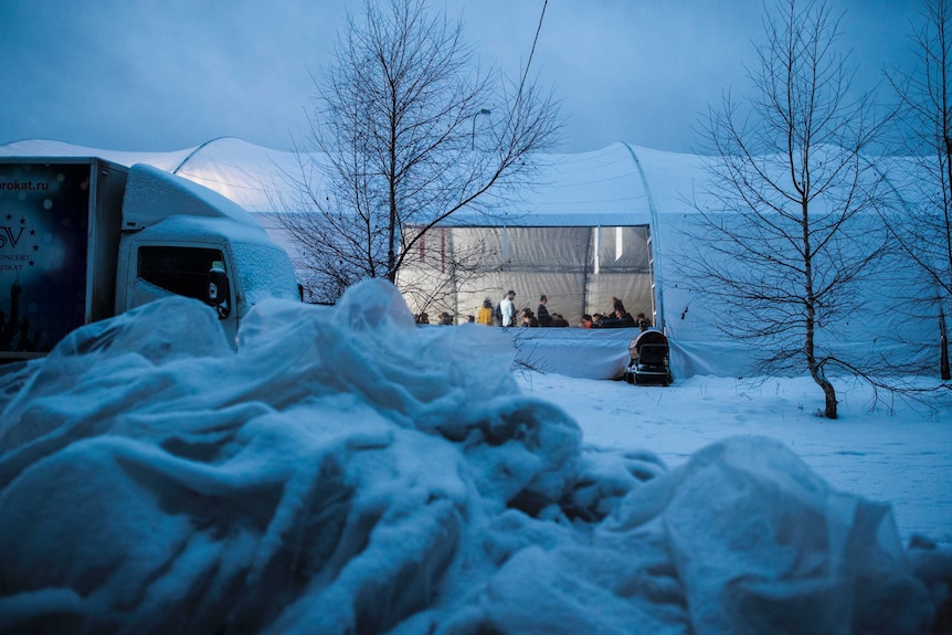 A tent pitched in the snow with Alexei Navalny's supporters inside.