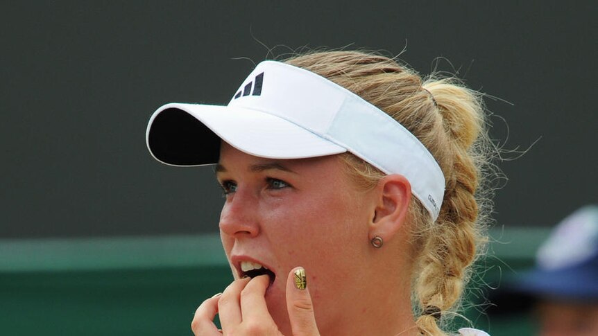 Another major failure ... Caroline Wozniacki ponders her fourth-round exit.