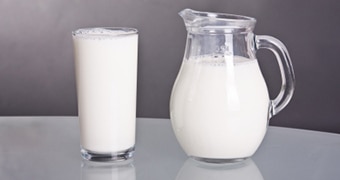 Glass and jug of milk