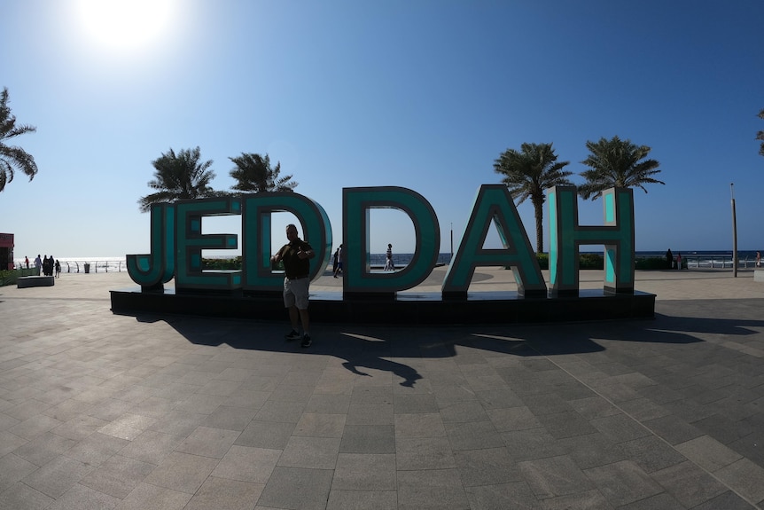 Large letters reading 'Jeddah'.