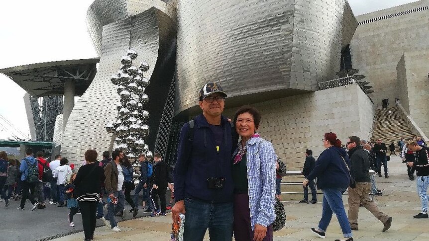 Peter Chung with his wife Joyce on a holiday, following his forced retirement.