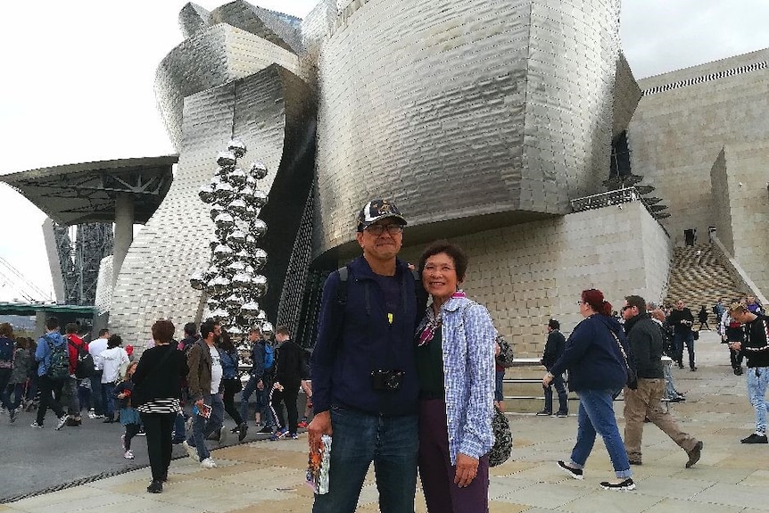 Peter Chung with his wife Joyce on a holiday, following his forced retirement.