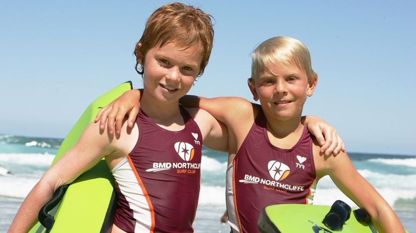 LtoR 8-year-old nippers, Spencer Jeams and Jake Satherley, who rescued a drowning man