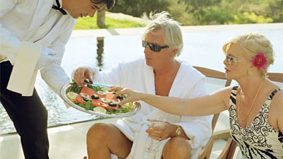 Mature couple relax on a boat