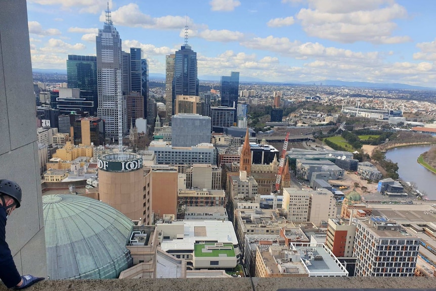 A view of Melbourne including the yarra and the MCG from the top of a building on Collins Street
