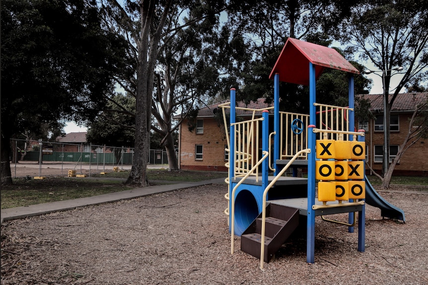 Playground equipment in front of the Tarkan st flats