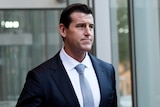Ben Roberts-Smith dressed in a suit and tie