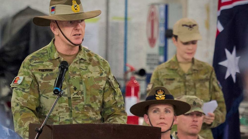 John Frewen addresses the Australian Defence Force during a ceremony in the Middle East.