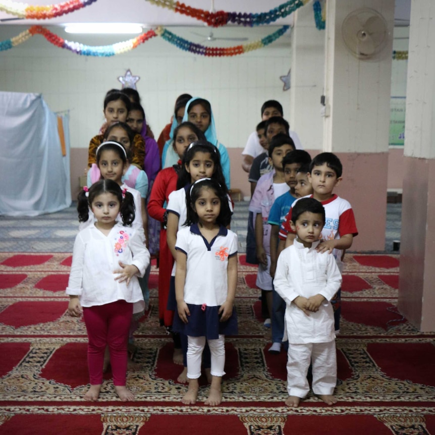 Pakistani children pose for a group photo.