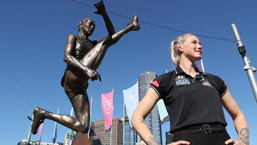 AFLW star Tayla Harris at the unveiling of a prototype statue.