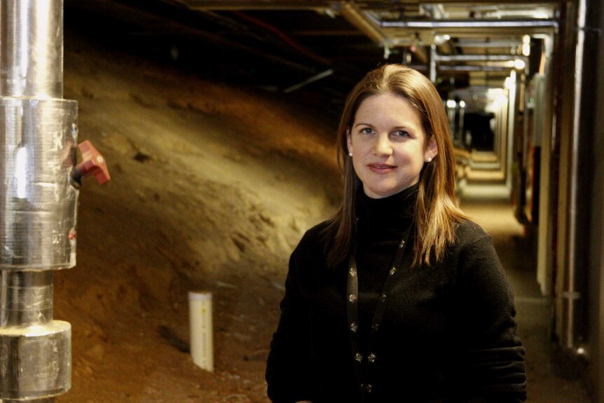 Hanna Slattery in an underground corridor.