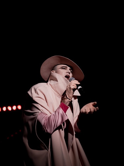 Performer onstage at launch of In The Hanging Garden, Dark Mofo, Hobart 2019.