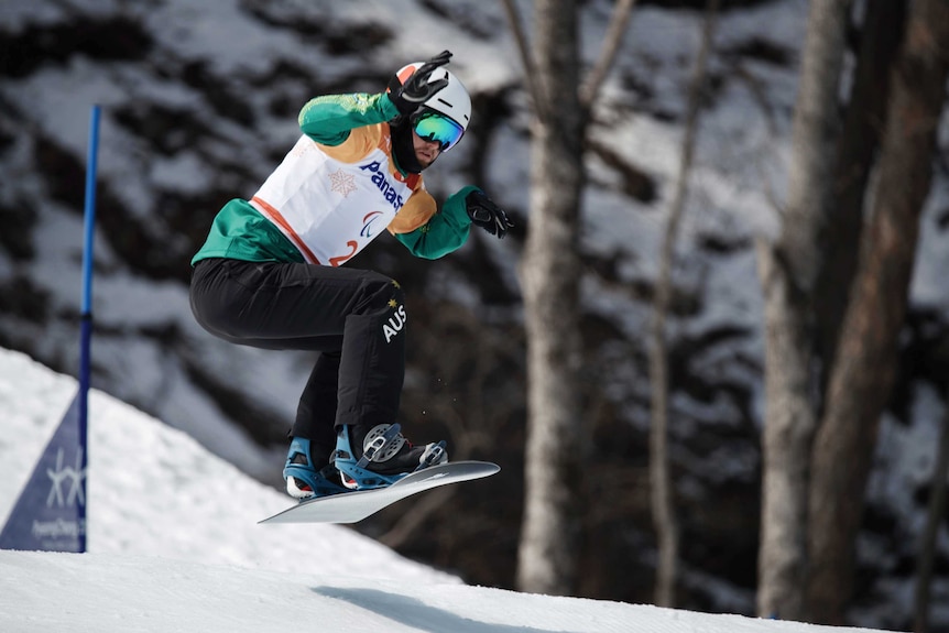 Australia's Simon Patmore competes in men's snowboard cross at the Winter Paralympics