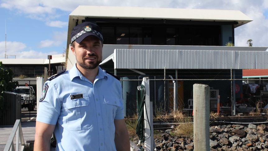 Senior Sergeant Jay Notaro in front of the water police building at the Southport Spit.