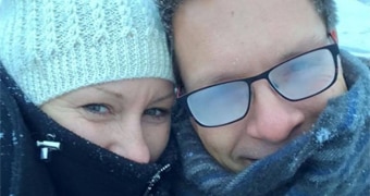 Justine and Don Damond smile in the snow.