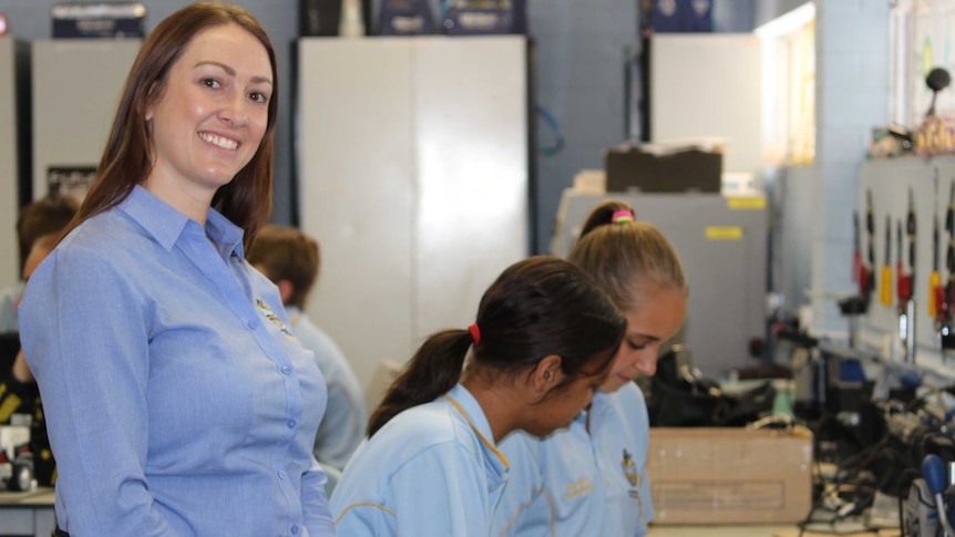 Bunbury teacher Ashley Stewart stands in front of kids in maths class