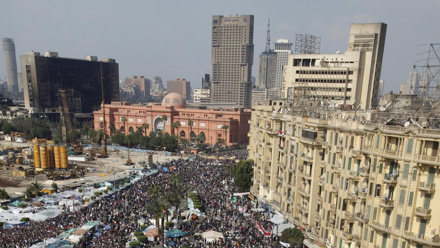 Huge crowds: Opposition supporters hold Friday prayers in Tahrir Square