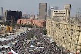 Friday prayers: Opposition supporters attend prayers in Tahrir Square in Cairo.