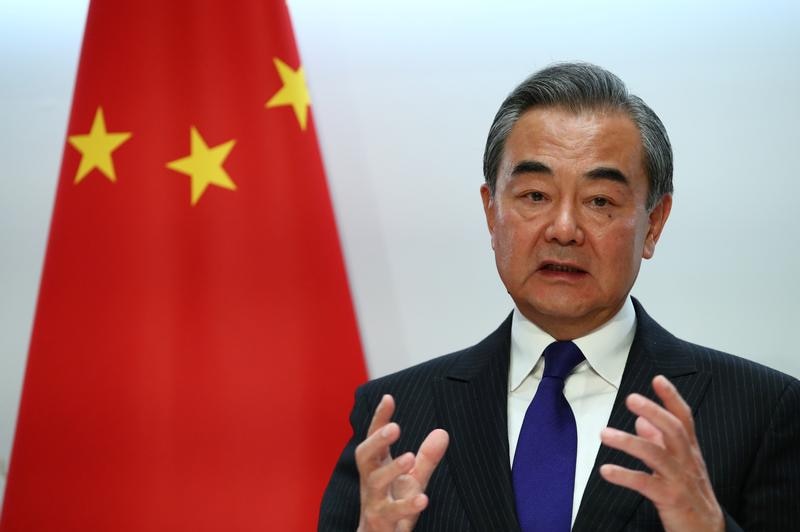 Chinese Foreign Minister Wang Yi gesturing.