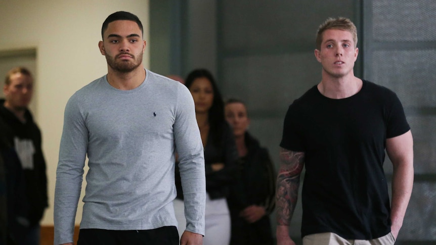 Dylan Walker and Aaron Gray walk out of hospital