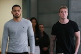 Dylan Walker and Aaron Gray walk out of hospital