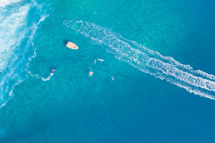 An aerial view of boats in the ocean near Teahupo'o, Tahiti, in this image taken on May 20, 2019.