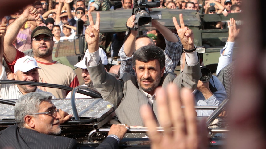 Mahmoud Ahmadinejad greets Hezbollah supporters (Reuters: Jamal Saidi)
