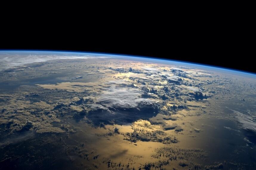 Sunrise over the planet from space
