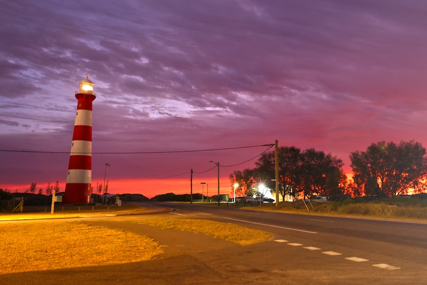 At dusk the point moore lighthouse with its light on 