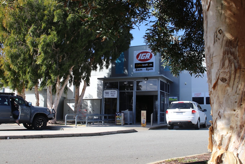 A photo of an IGA exterior taken from a car park.