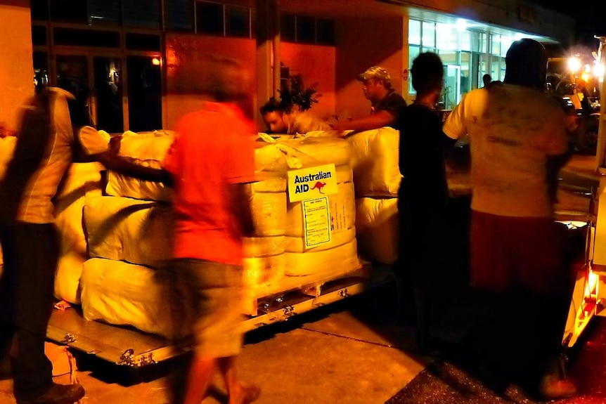 Aid from Australia arrives in the Solomon Islands in the wake of flash flooding.