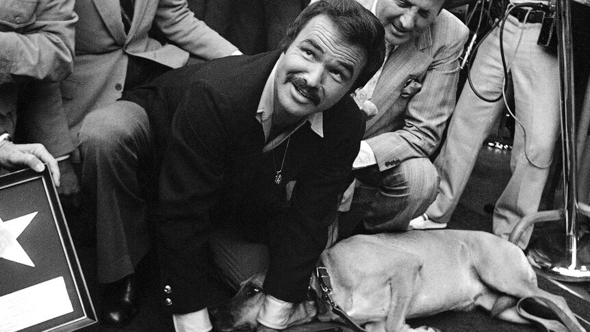 Burt Reynolds by his star on the Hollywood Walk of Fame