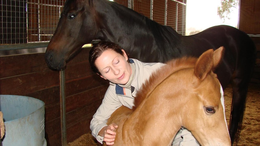 Susan Elekessy with her filly at Callum Park dressage stables, Wamboin