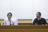 Myanmar Nobel laureate Aung San Suu Kyi speaks to media during a press conference with Shwe Mann