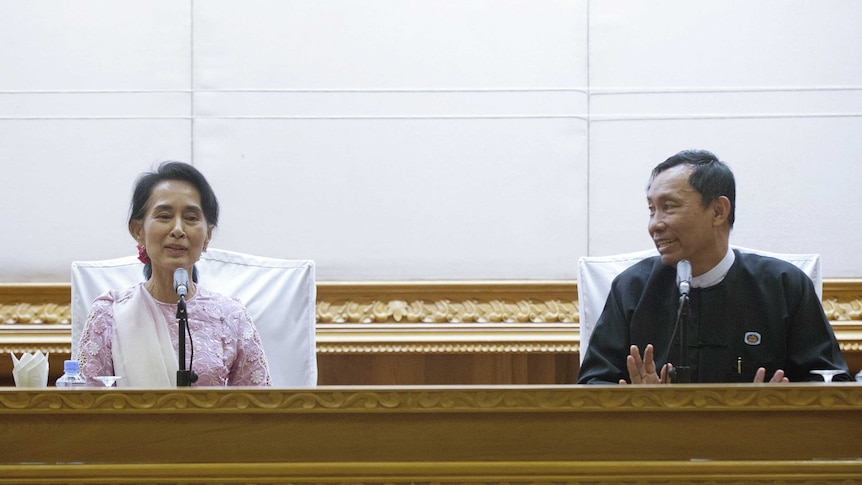 Myanmar Nobel laureate Aung San Suu Kyi speaks to media during a press conference with Shwe Mann