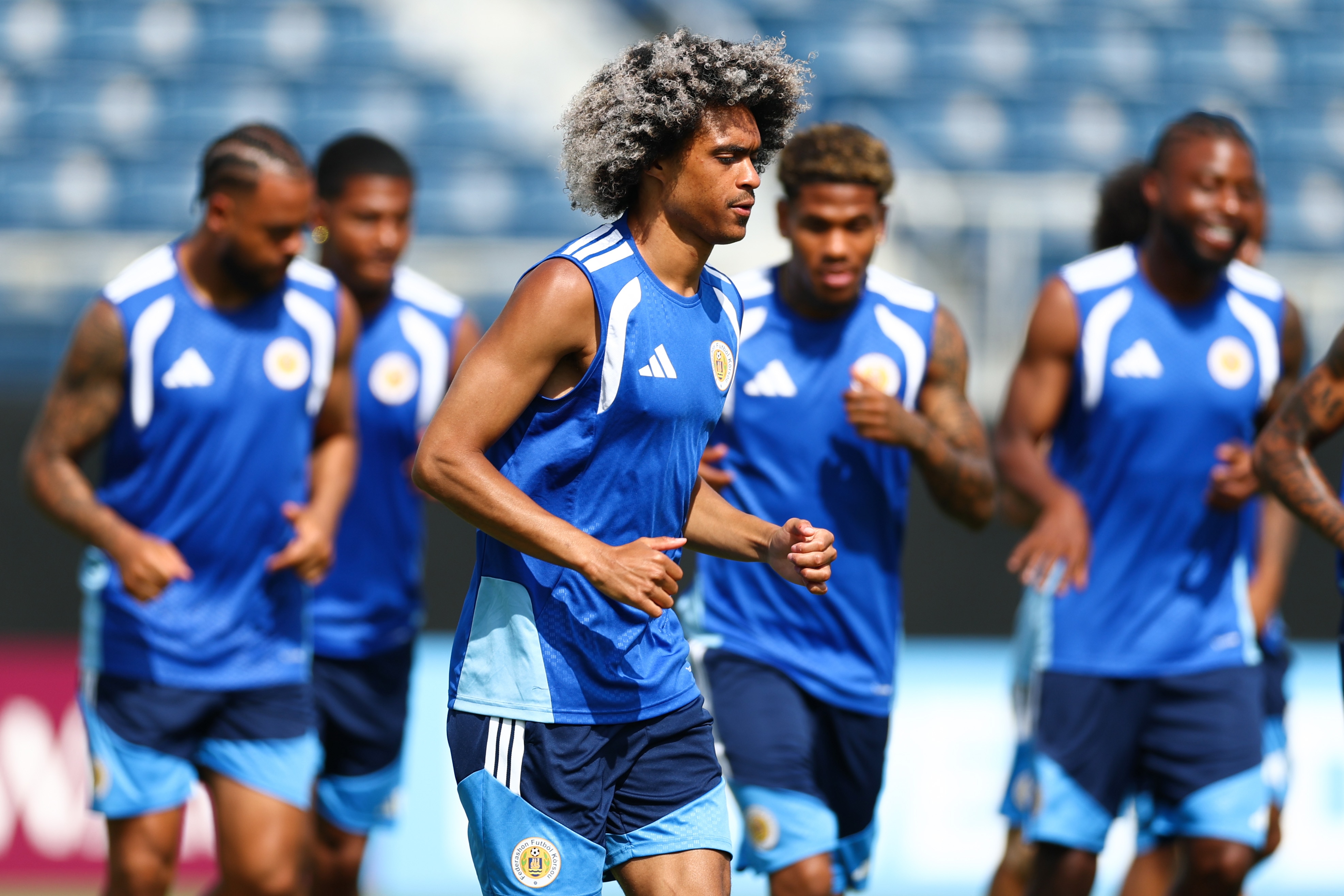 Tahith Chong warning up