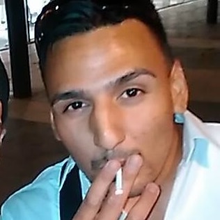 James Gargasoulas smokes a cigarette.