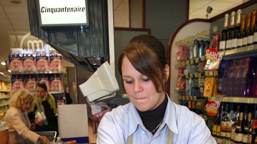 girl worker in supermarket