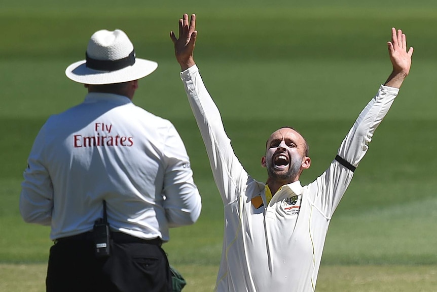 Nathan Lyon appeals on day five of the first Test against India at Adelaide Oval