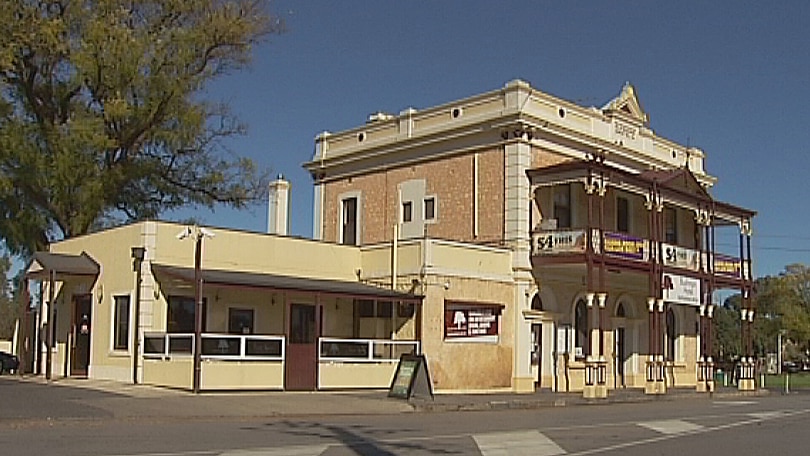 Three people charged over the Bushman Hotel attack