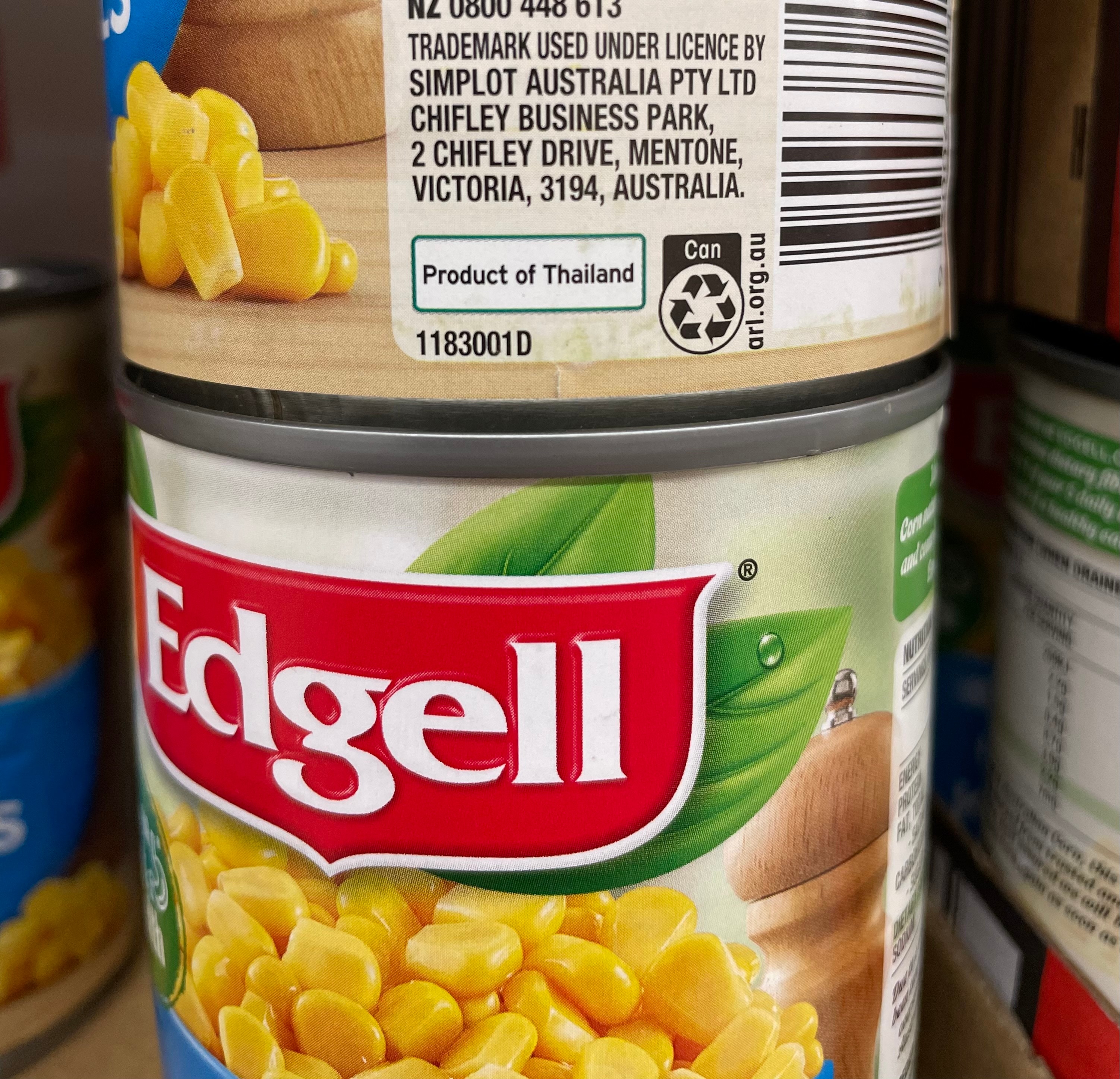 A tin with a picture of yellow corn