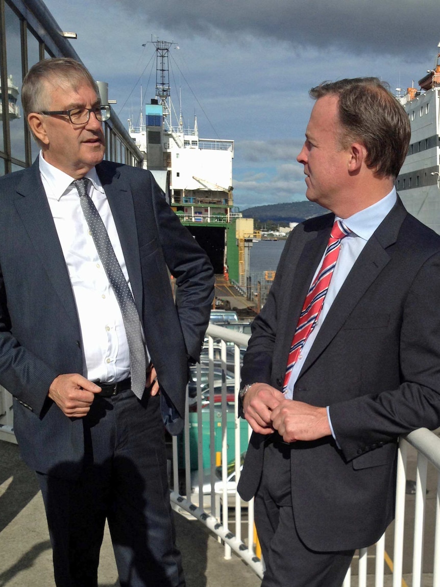 Tasmanian Infrastructure Minister Rene Hidding and Premier Will Hodgman next to the Spirit of Tasmania.