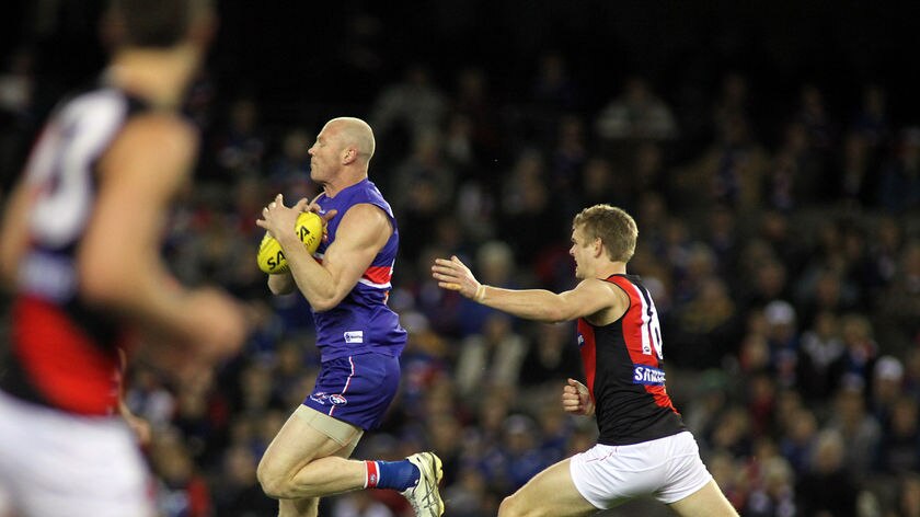 Cruising home...Barry Hall reels in a simple mark against the Bombers.