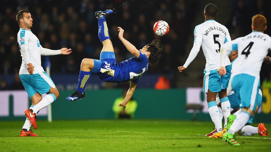 Leicester City's Shinji Okazaki scores a goal with an overhead kick against Newcastle.