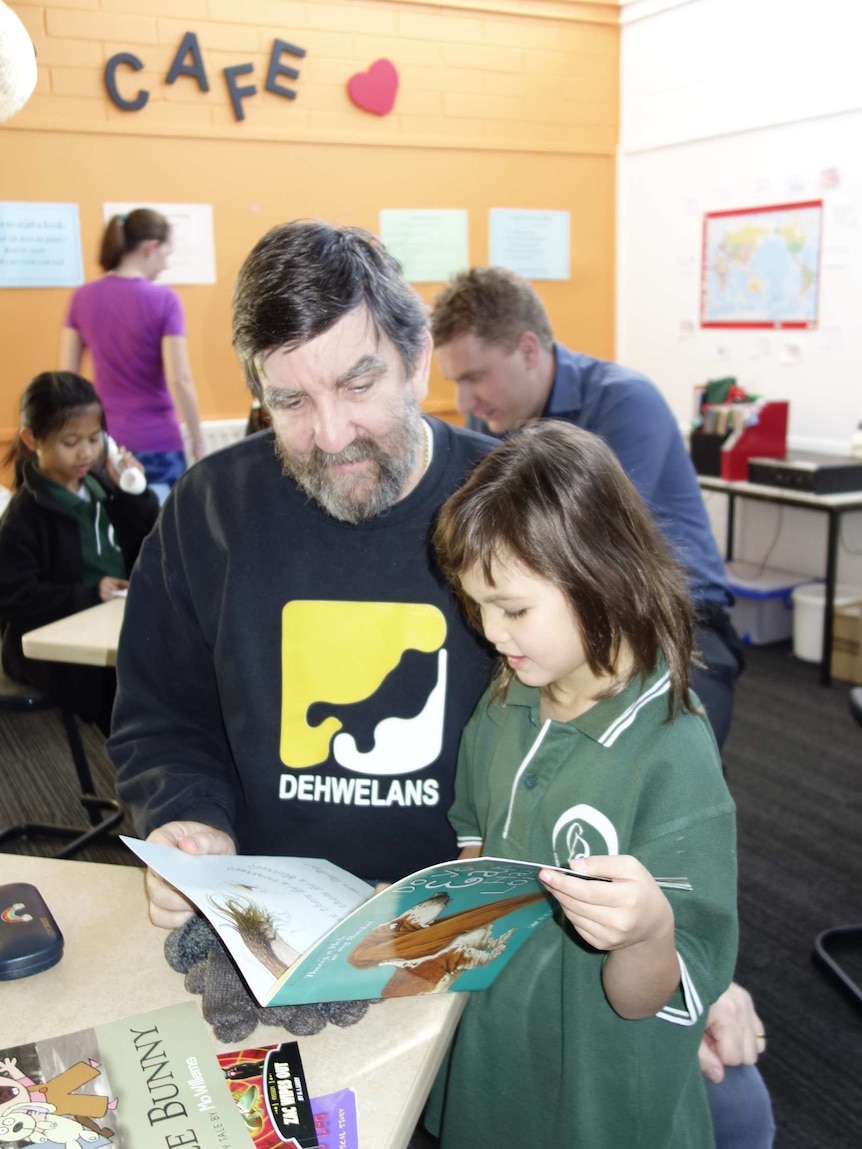 Michael Lightfoot and daughter Eleanor read together at the Active Brain Cafe.