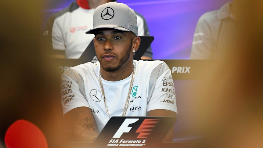Mercedes driver Lewis Hamilton listens to questions ahead of the 2016 Belgian F1 Grand Prix.