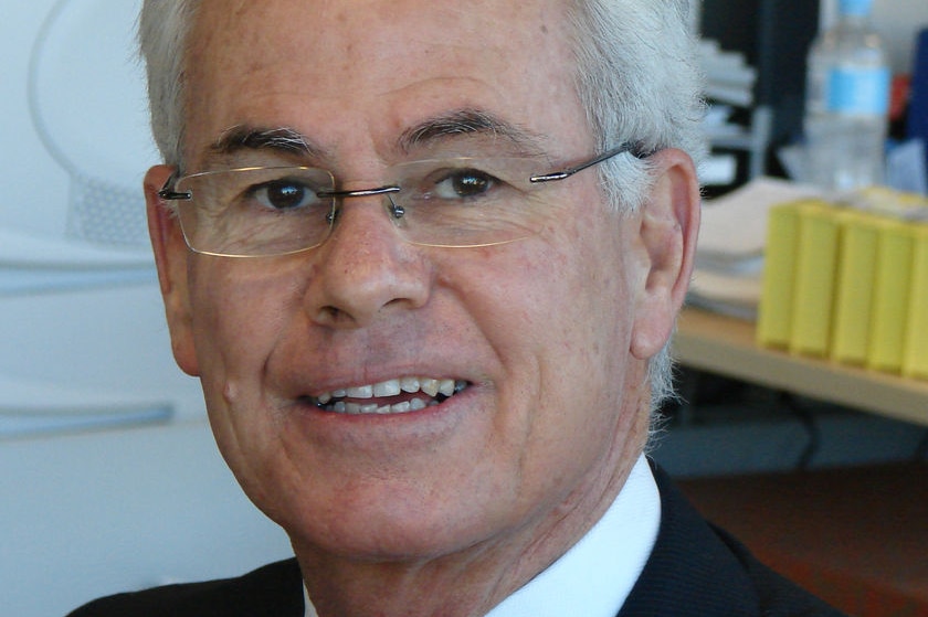 A tight head shot of Peter Kennedy smiling,