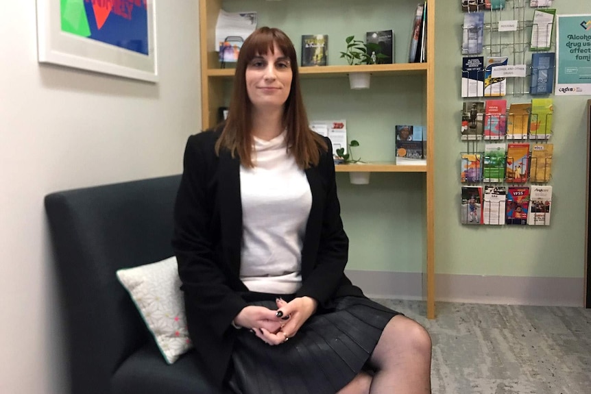 An female academic in her Brisbane office.