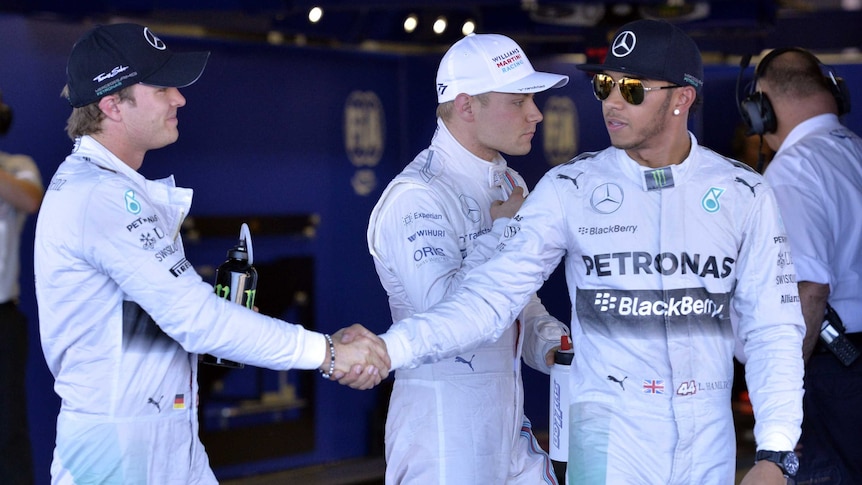 Lewis Hamilton and Nico Rosberg shake hands after Russian qualifying