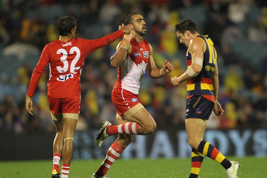 Goodes and Jetta celebrate